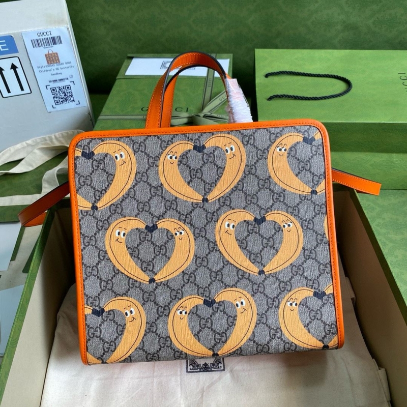 G*u*i shopping bags